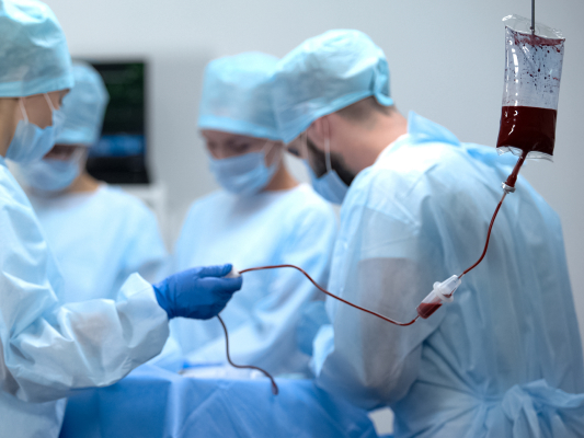 Intravenous drip in operation room, blood transfusion during surgery